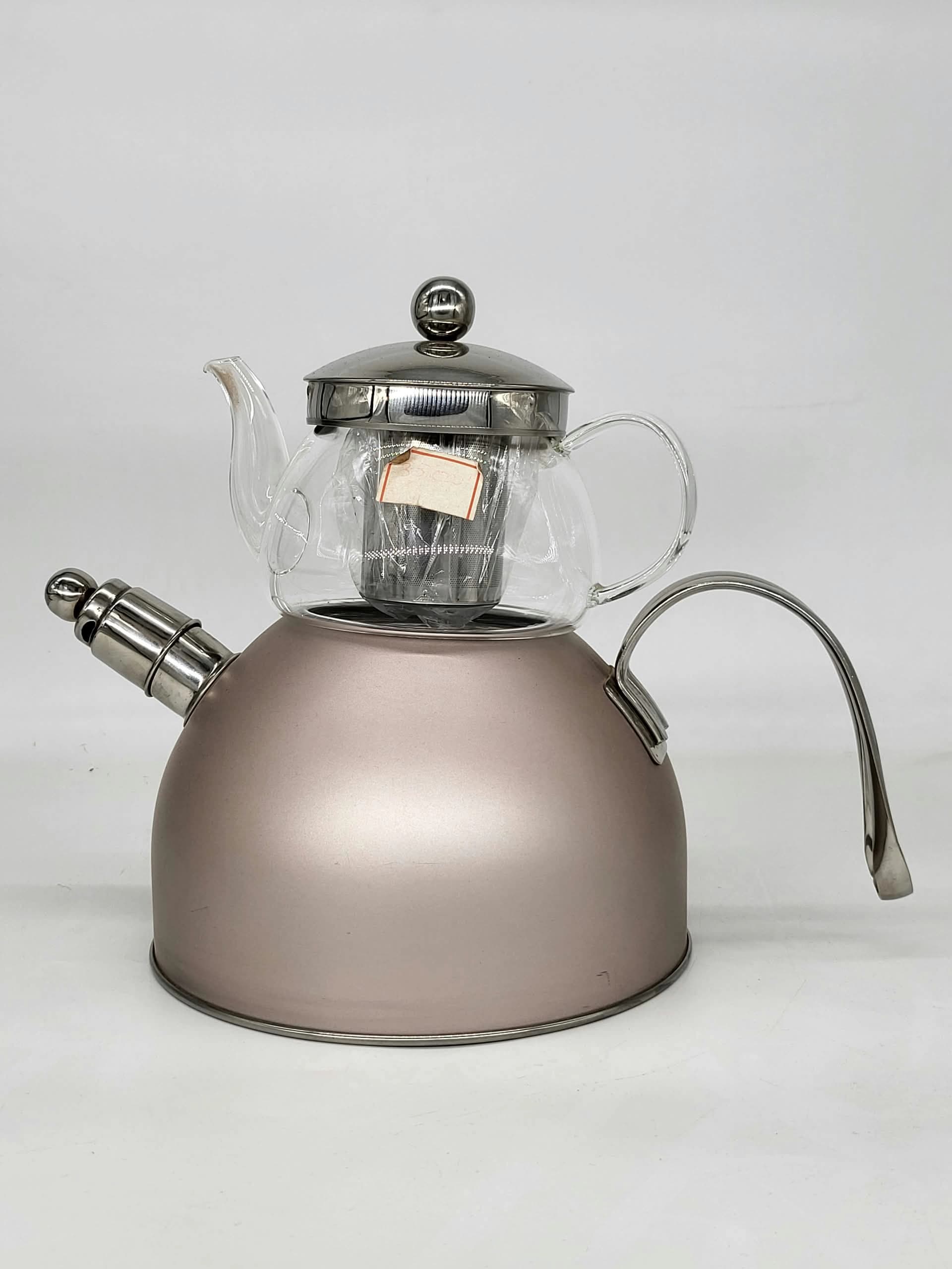 Bouilloire en acier inoxydable couleur or rose surmontée d’une théière en verre résistant à la chaleur avec infuseur intégré